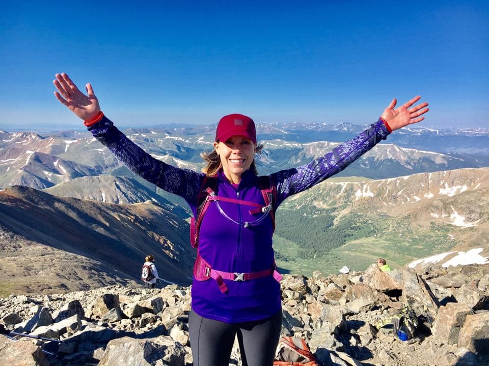 Celebrating at a Colorado mountain summit
